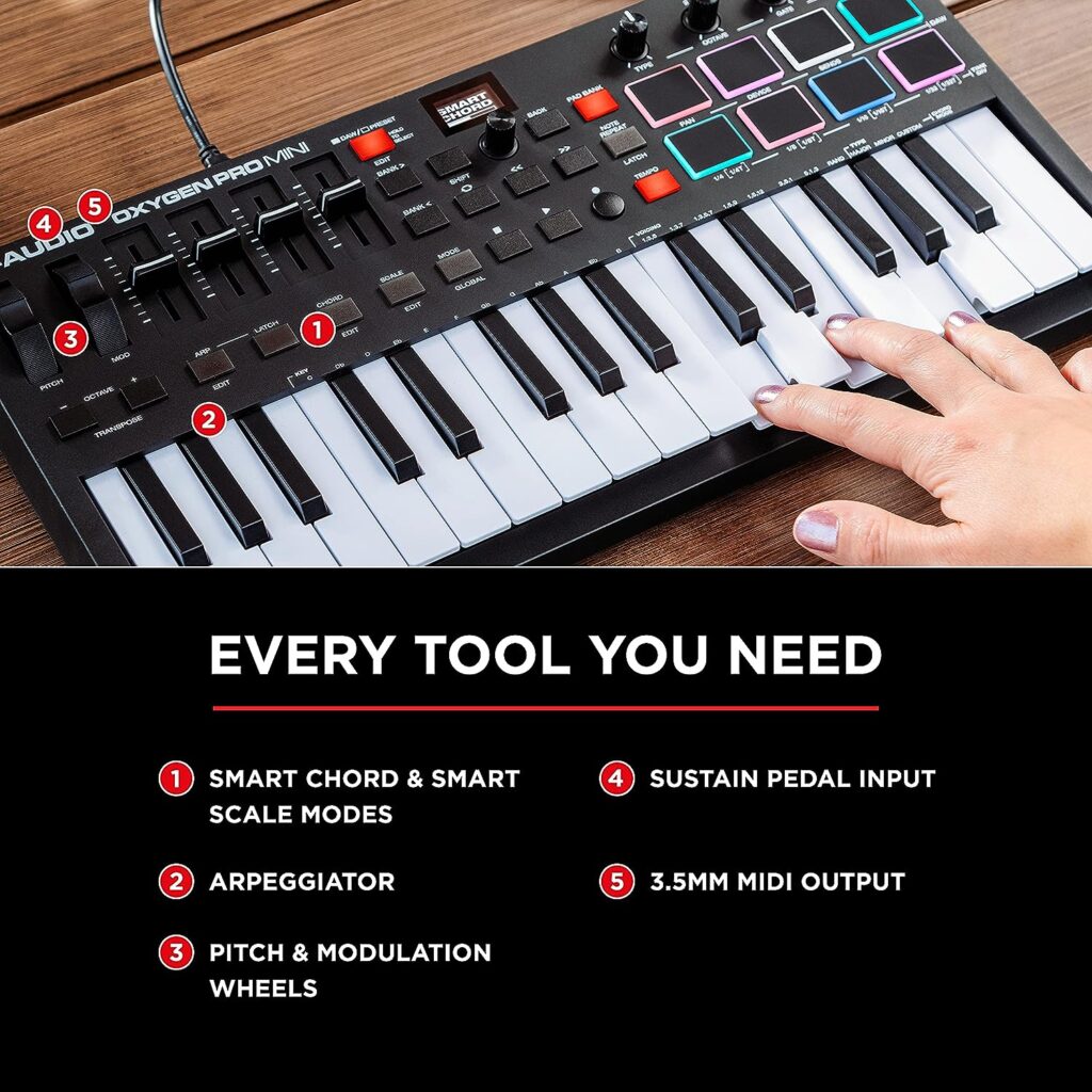 M-Audio Oxygen Pro Mini – 32 Key USB MIDI Keyboard Controller With Beat Pads, MIDI assignable Knobs, Buttons  Faders and Software Suite Included,black